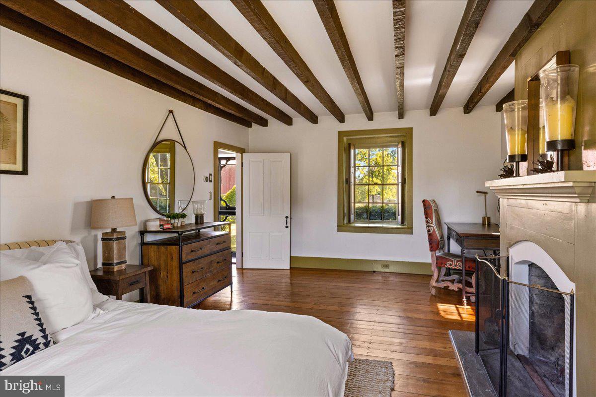 481 Quarry Road Ottsville, PA 18942 - Photo 26 of 64 a living room with furniture and a fireplace