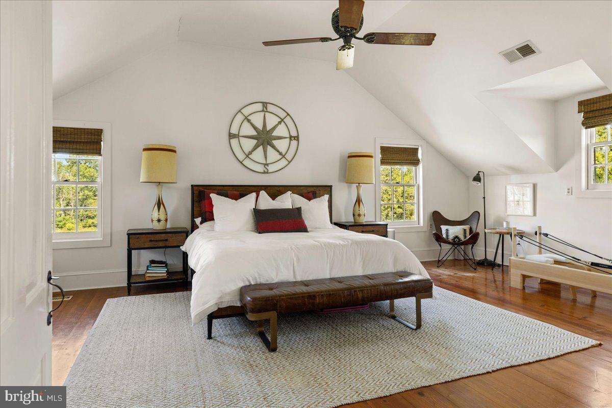 481 Quarry Road Ottsville, PA 18942 - Photo 30 of 64 a bedroom with a bed and wooden floor