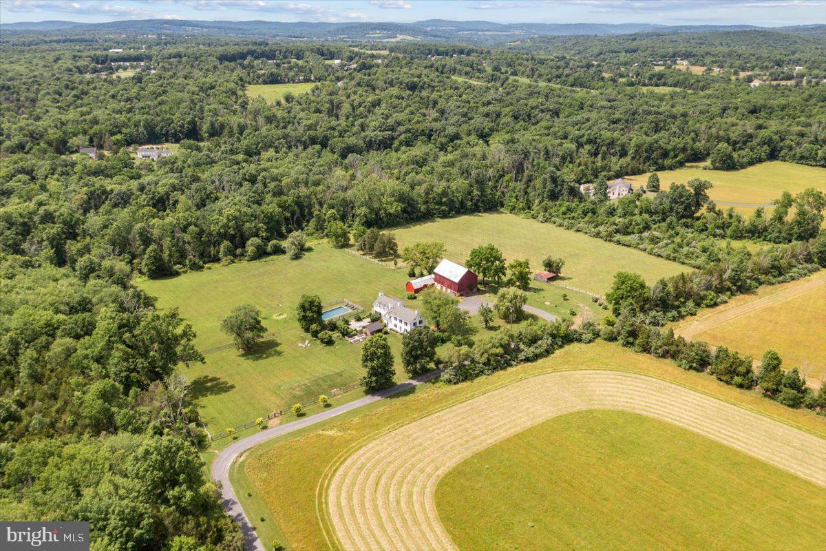 481 Quarry Road Ottsville, PA 18942 - Photo 3 of 64 a view of a swimming pool with a yard