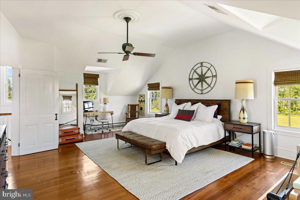 481 Quarry Road Ottsville, PA 18942 - Photo 33 of 64 a bedroom with a bed and wooden floor