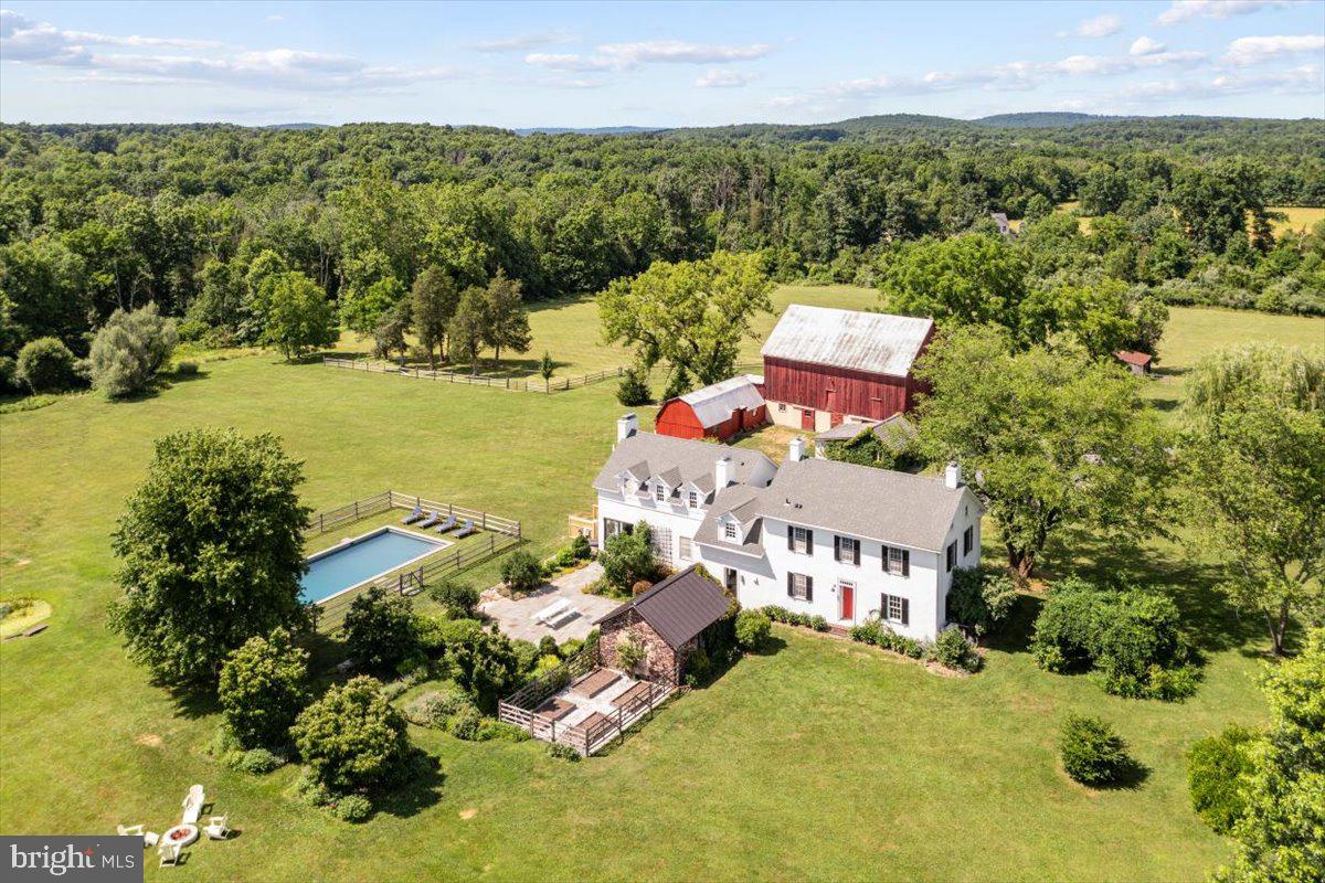 481 Quarry Road Ottsville, PA 18942 - Photo 4 of 64 an aerial view of a house with a garden