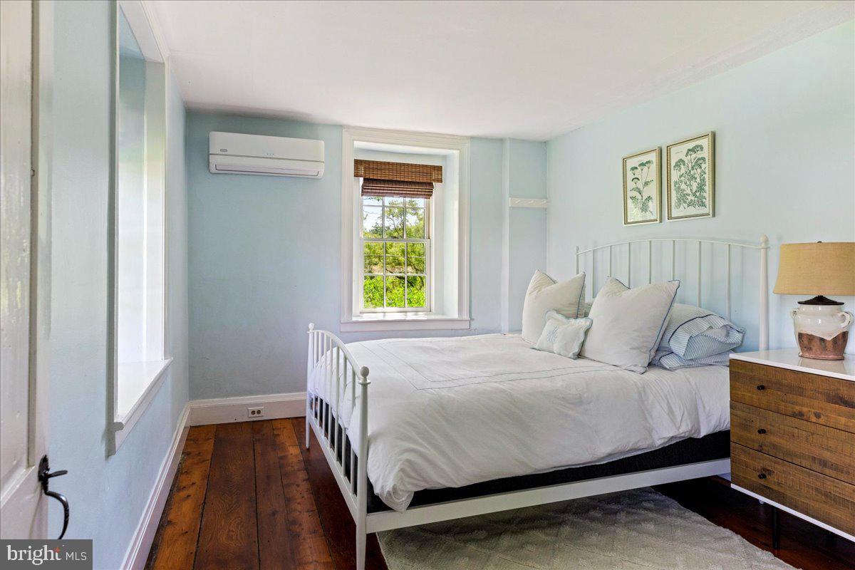 481 Quarry Road Ottsville, PA 18942 - Photo 42 of 64 a bedroom with a bed and a window