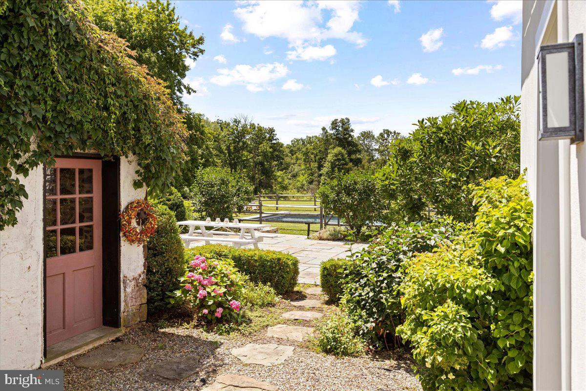 481 Quarry Road Ottsville, PA 18942 - Photo 51 of 64 a view of a garden with potted plants