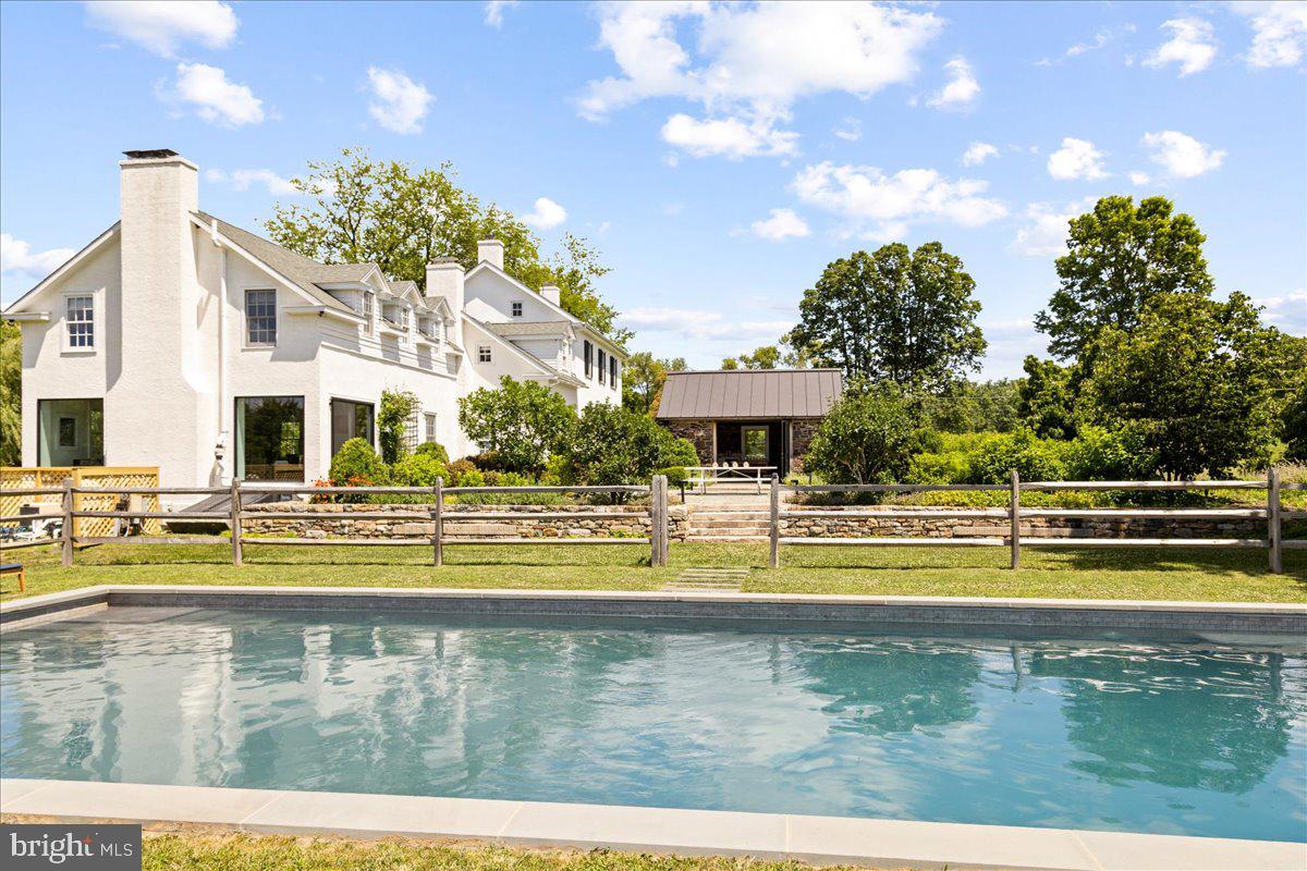 481 Quarry Road Ottsville, PA 18942 - Photo 56 of 64 a view of swimming pool with outdoor seating