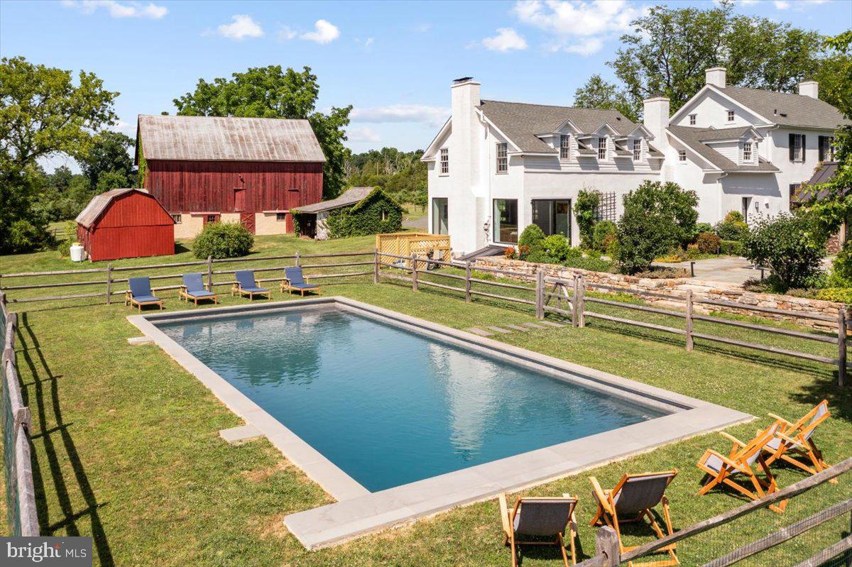 481 Quarry Road Ottsville, PA 18942 - Photo 6 of 64 a view of a swimming pool with chairs