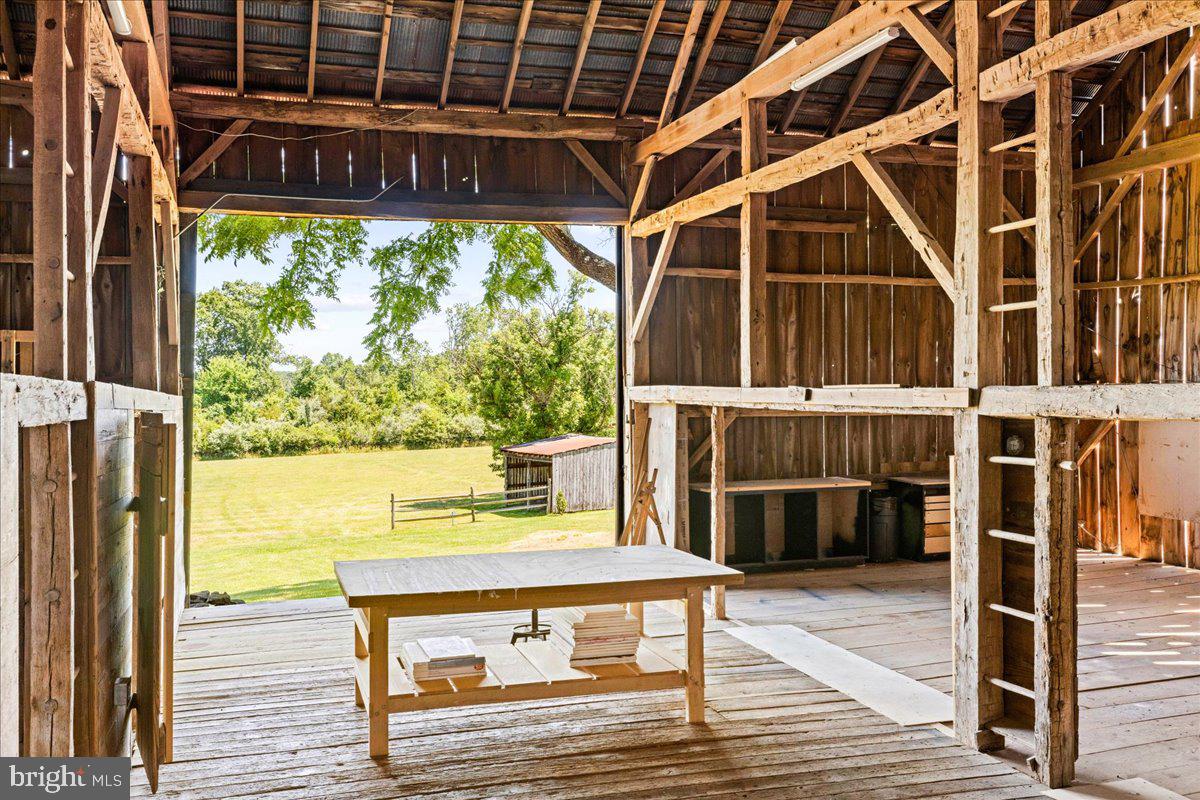 481 Quarry Road Ottsville, PA 18942 - Photo 62 of 64 a view of a balcony with wooden floor and outdoor space
