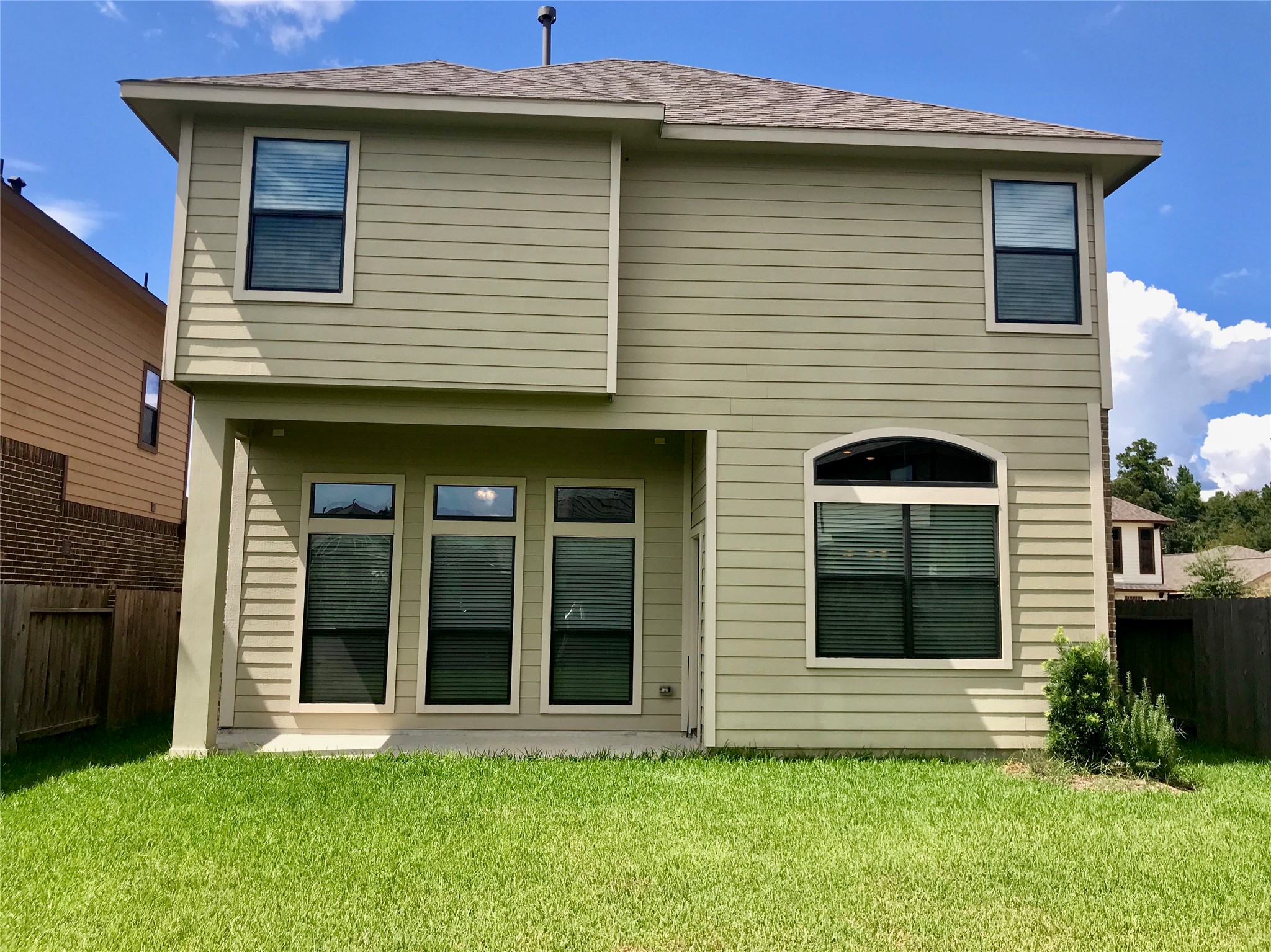 722 Audra Lane Spring, TX 77386 - Photo 26 of 27 a front view of a house with a yard