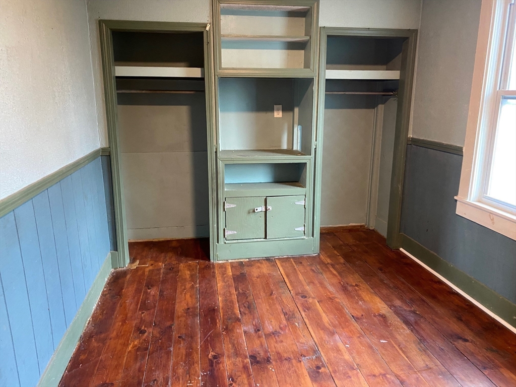 15 Norfolk Street Worcester, MA 01604 - Photo 15 of 18 a bedroom with a bed and a window