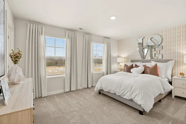 a view of a lake with couches