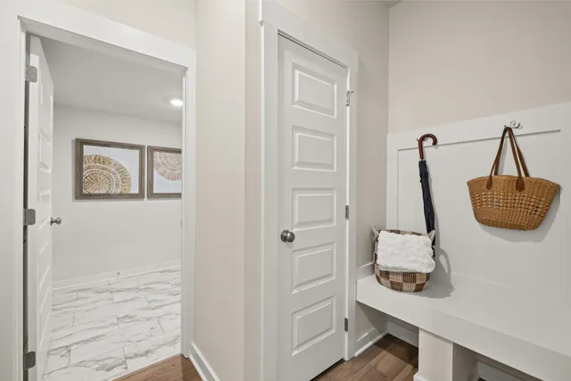 a kitchen with stainless steel appliances a stove a sink a refrigerator and a oven