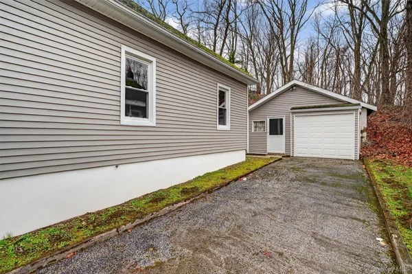 a house with trees in front of it