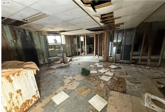 a view of a porch with wooden floor