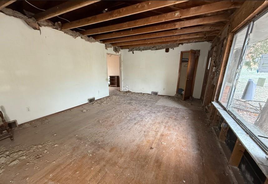 533 Blackhawk Road Beaver Falls, PA 15010 - Photo 2 of 20 a view of empty room with wooden floor and fan