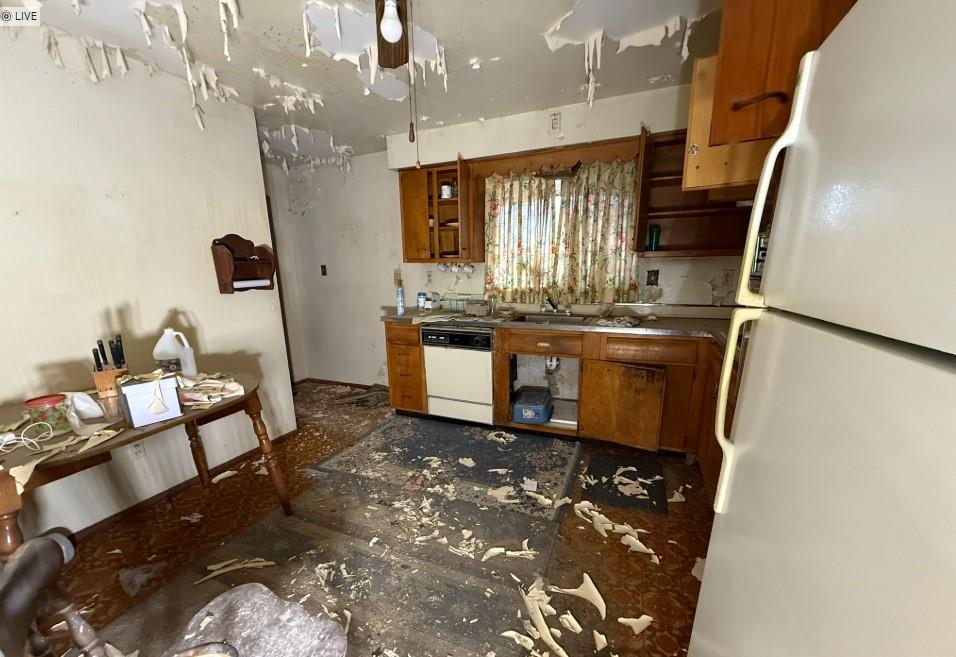 533 Blackhawk Road Beaver Falls, PA 15010 - Photo 5 of 20 a kitchen with stainless steel appliances granite countertop a sink stove and refrigerator