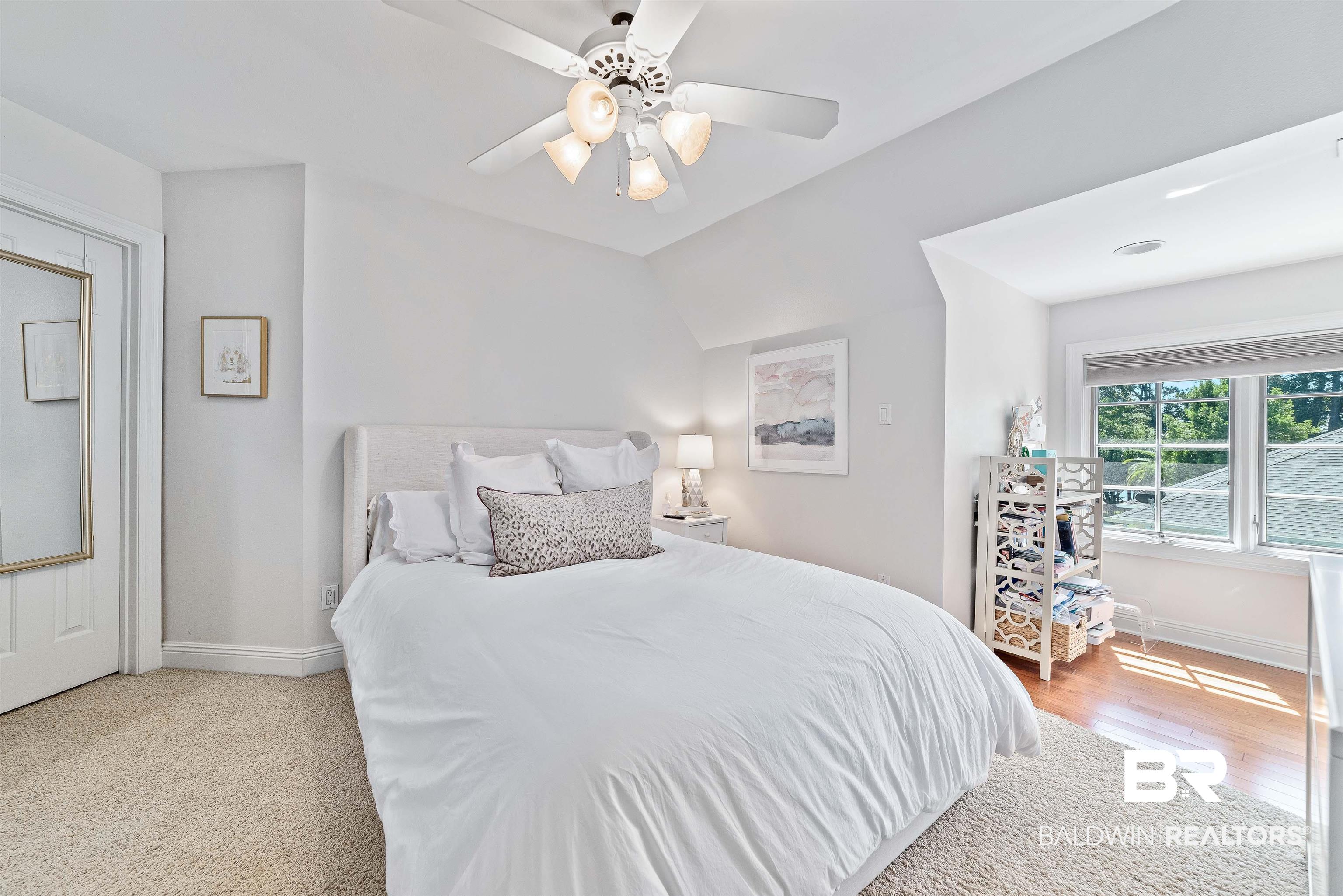 6630 East Quarry Drive Elberta, AL 36530 - Photo 33 of 63 Bedroom featuring a ceiling fan and baseboards