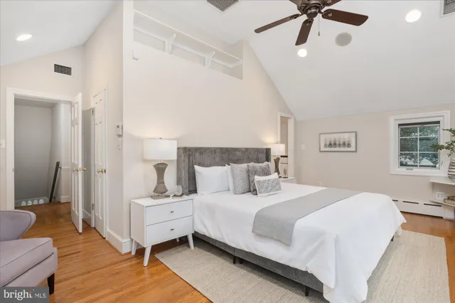 a bathroom with a sink a mirror and a shower