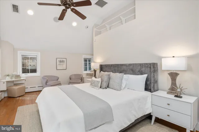 a view of staircase with white walls and a window