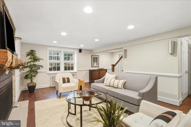 a bathroom with a sink a mirror and shower