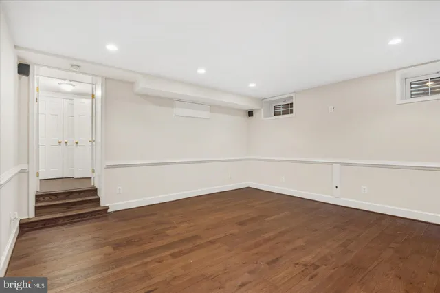 a view of a patio with table and chairs and potted plants