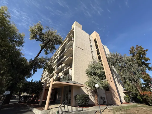 a view of a tall white building