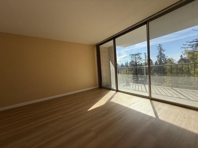 a view of a room with floor to ceiling window