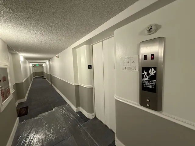 a view of a hallway with closet