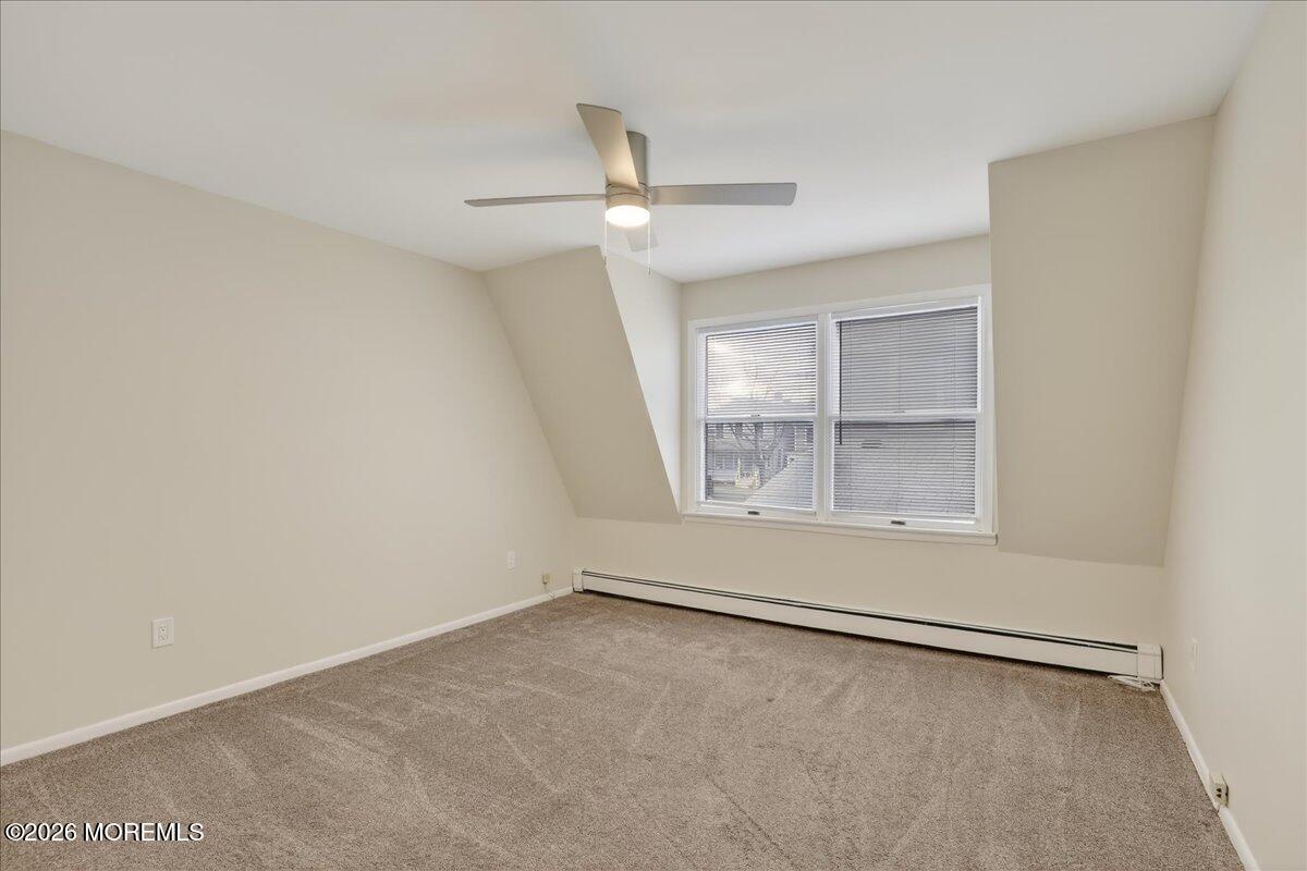 21 Washington Street, Unit D Red Bank, NJ 07701 - Photo 18 of 27 an empty room with a empty space and a window