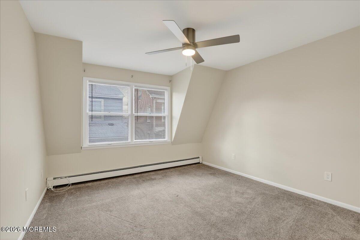 21 Washington Street, Unit D Red Bank, NJ 07701 - Photo 22 of 27 an empty room with a empty space and windows