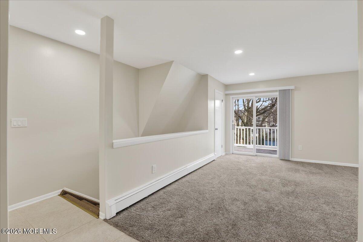 21 Washington Street, Unit D Red Bank, NJ 07701 - Photo 7 of 27 a view of an empty room with a window