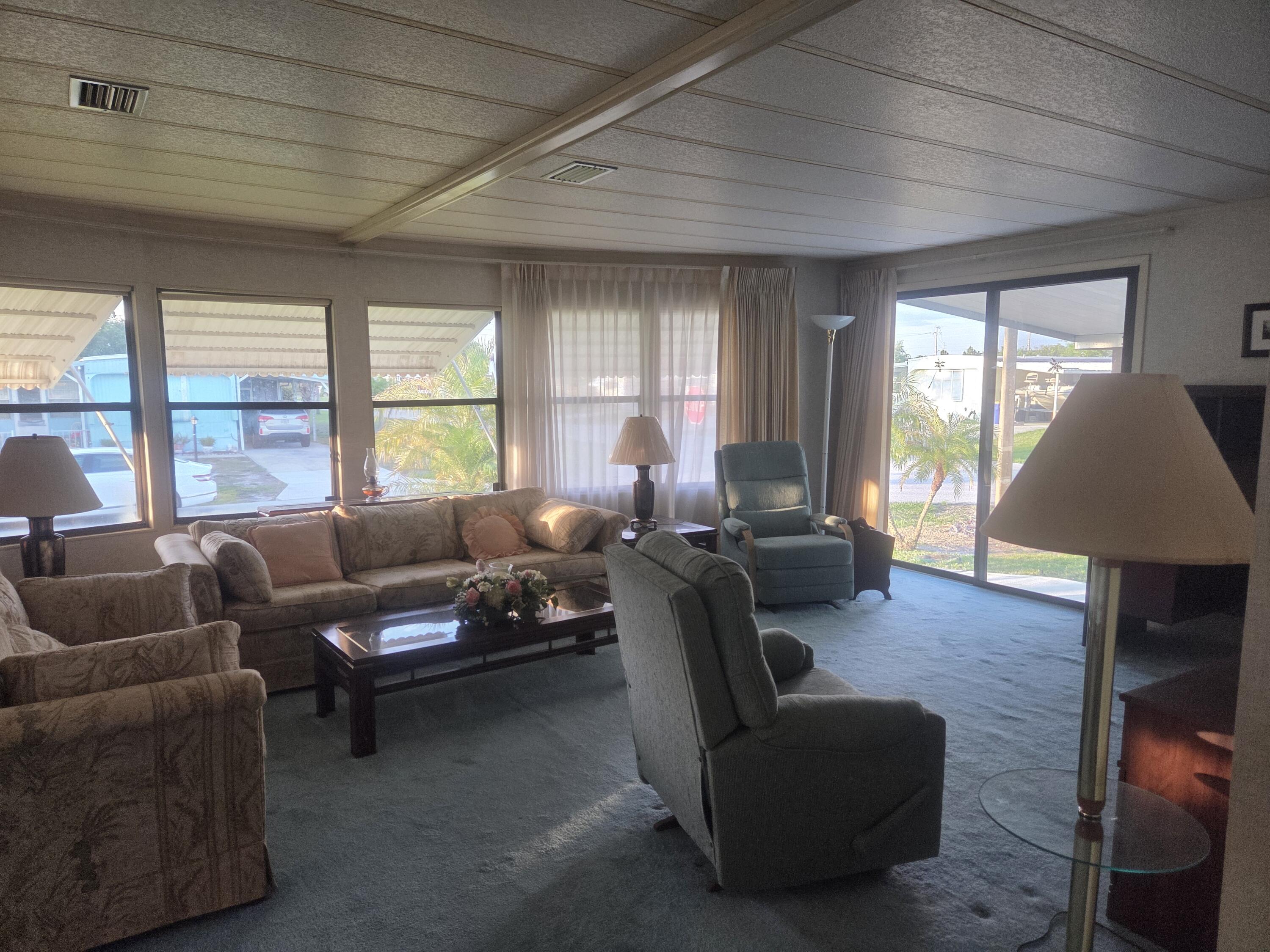 7107 Southeast Seahawk Street Hobe Sound, FL 33455 - Photo 12 of 22 livingroom 3