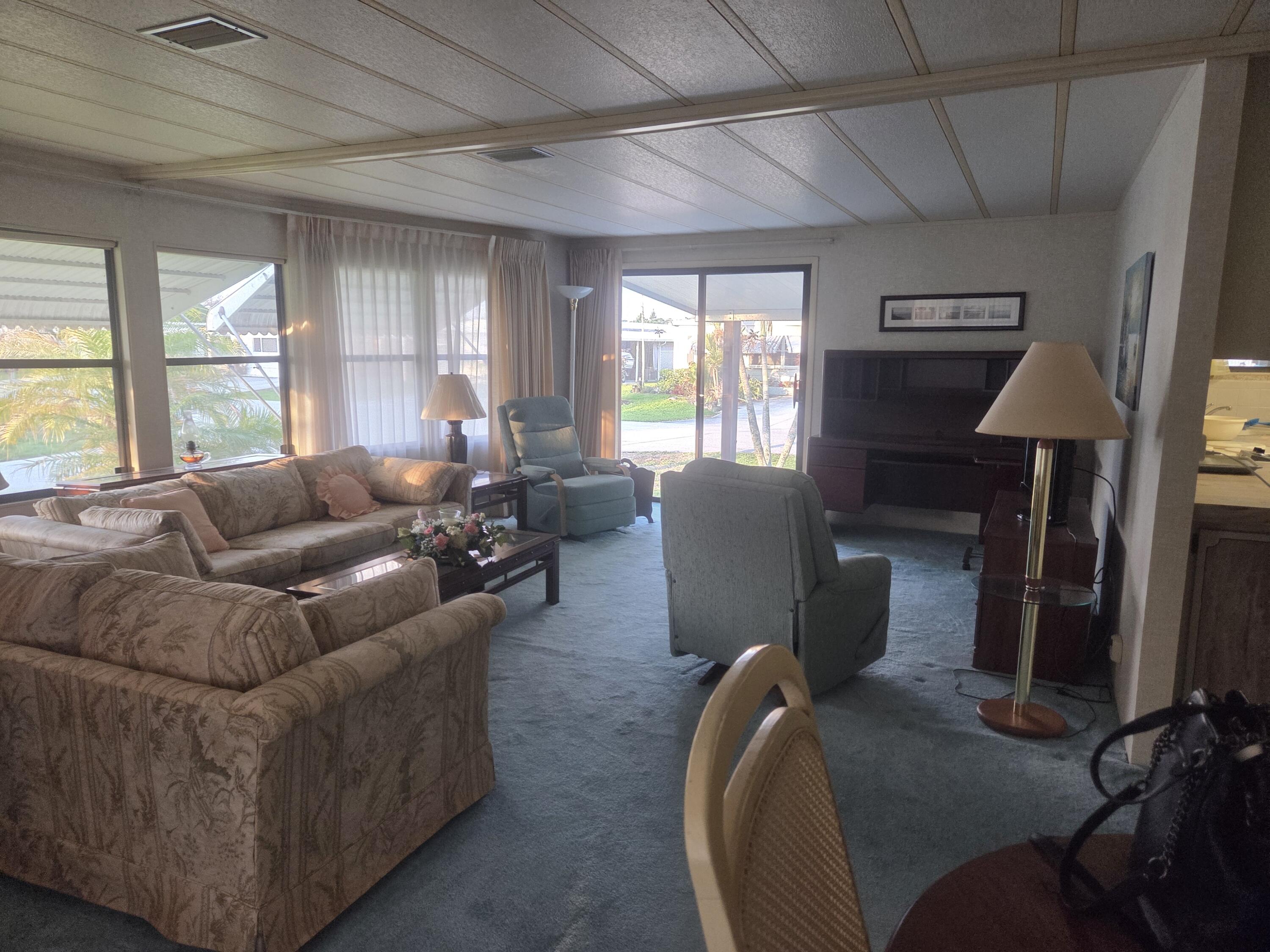 7107 Southeast Seahawk Street Hobe Sound, FL 33455 - Photo 13 of 22 livingroom 1