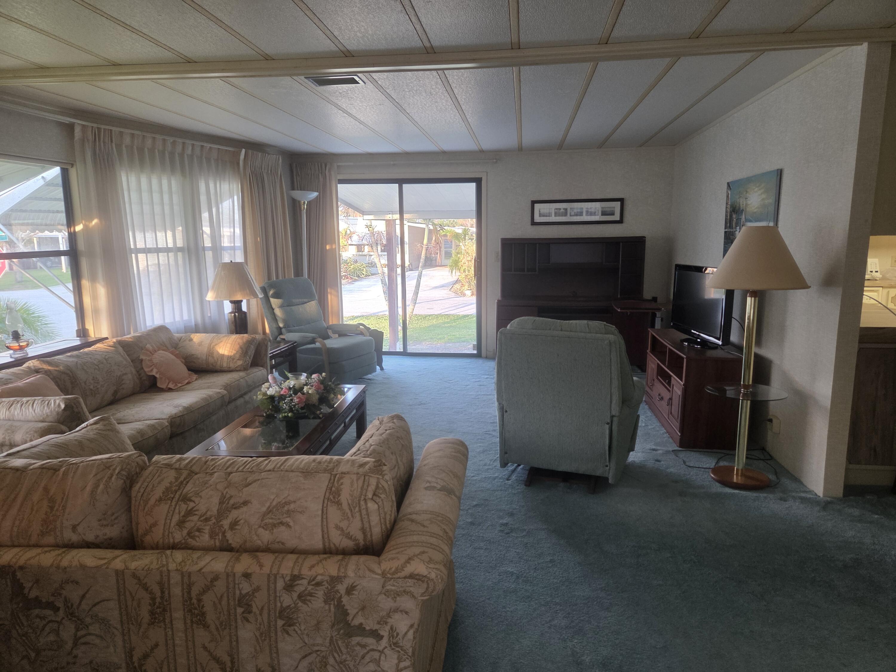 7107 Southeast Seahawk Street Hobe Sound, FL 33455 - Photo 14 of 22 livingroom 2