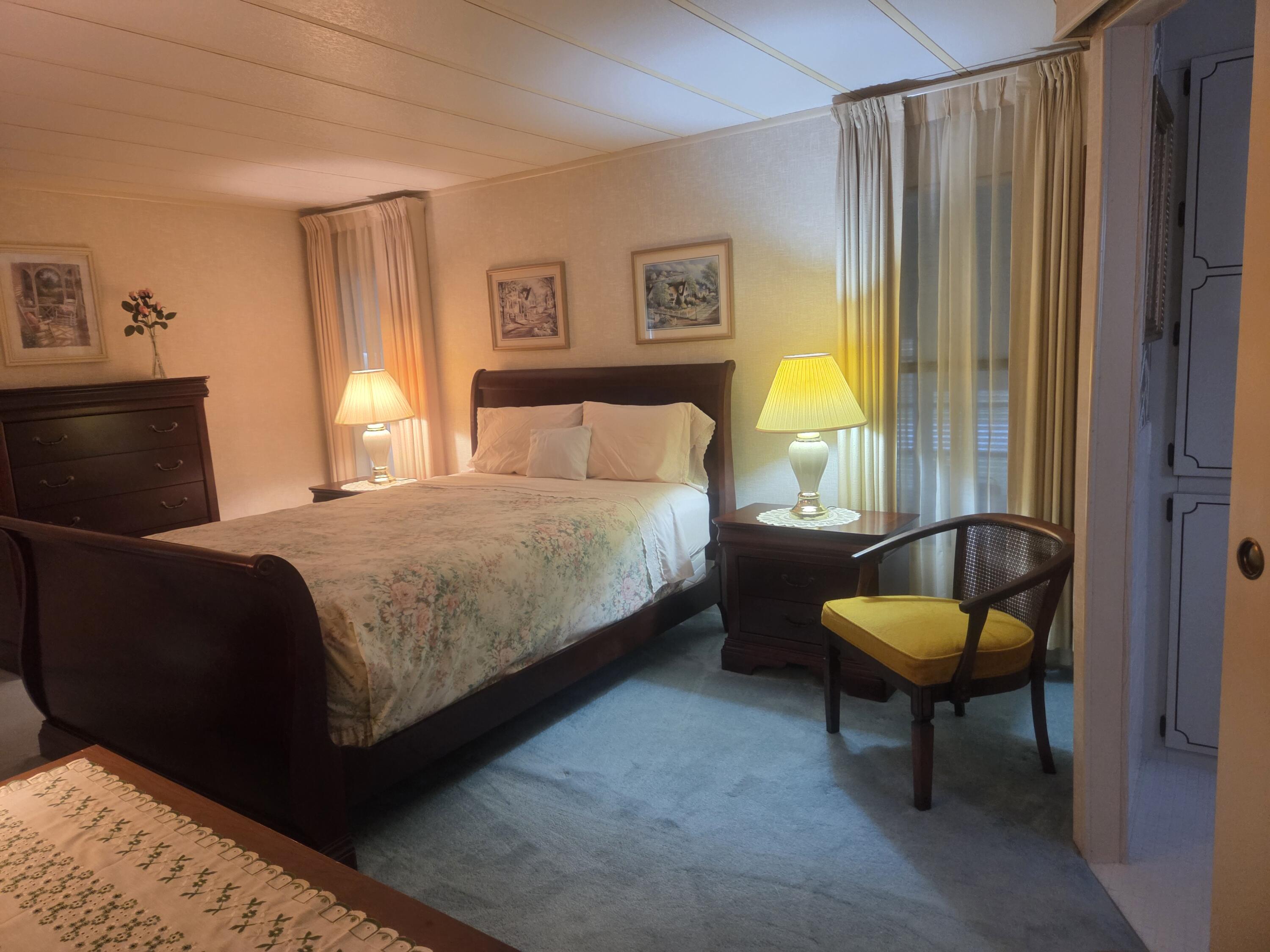 7107 Southeast Seahawk Street Hobe Sound, FL 33455 - Photo 18 of 22 primary bedroom