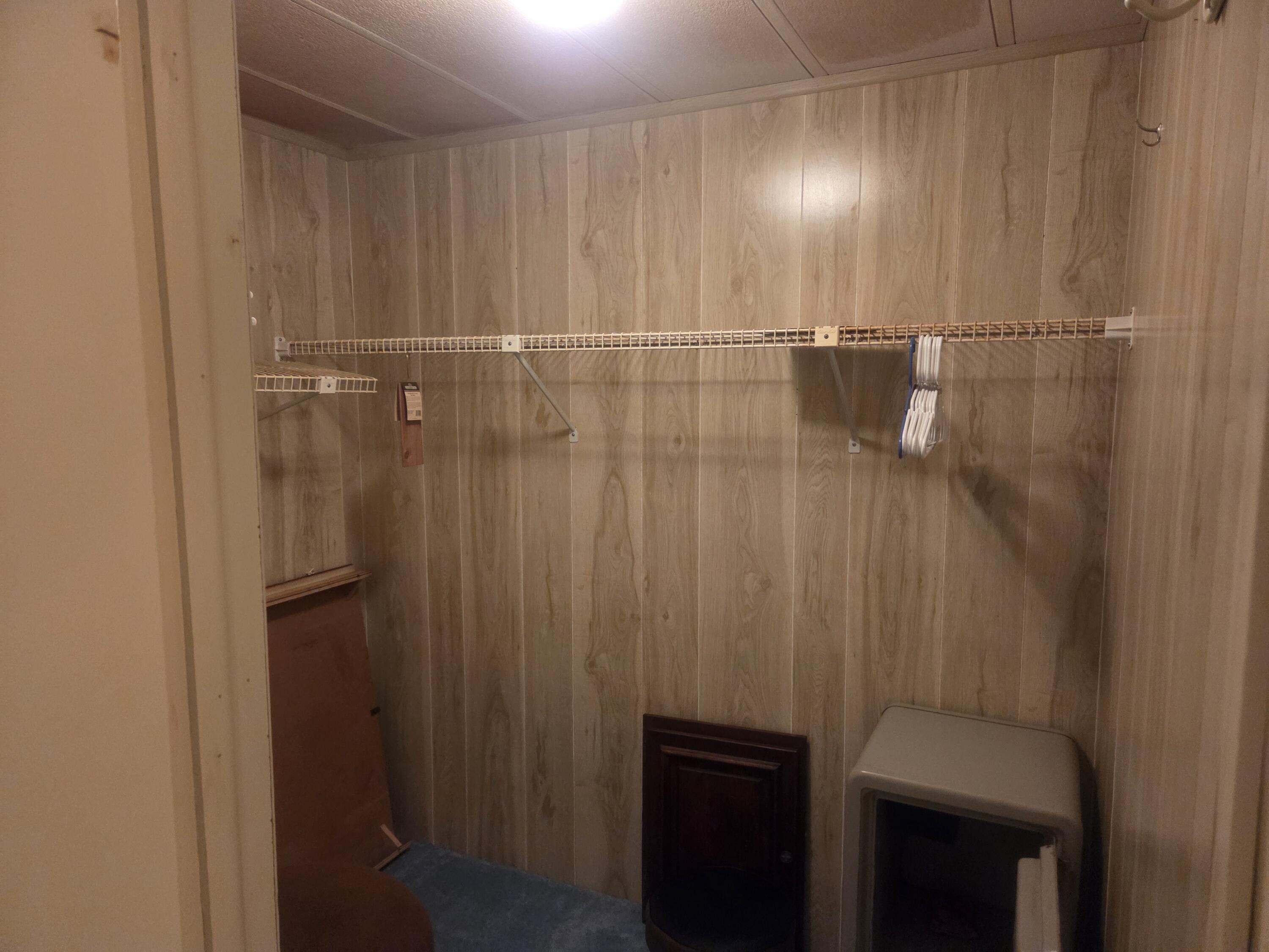 7107 Southeast Seahawk Street Hobe Sound, FL 33455 - Photo 19 of 22 primary closet