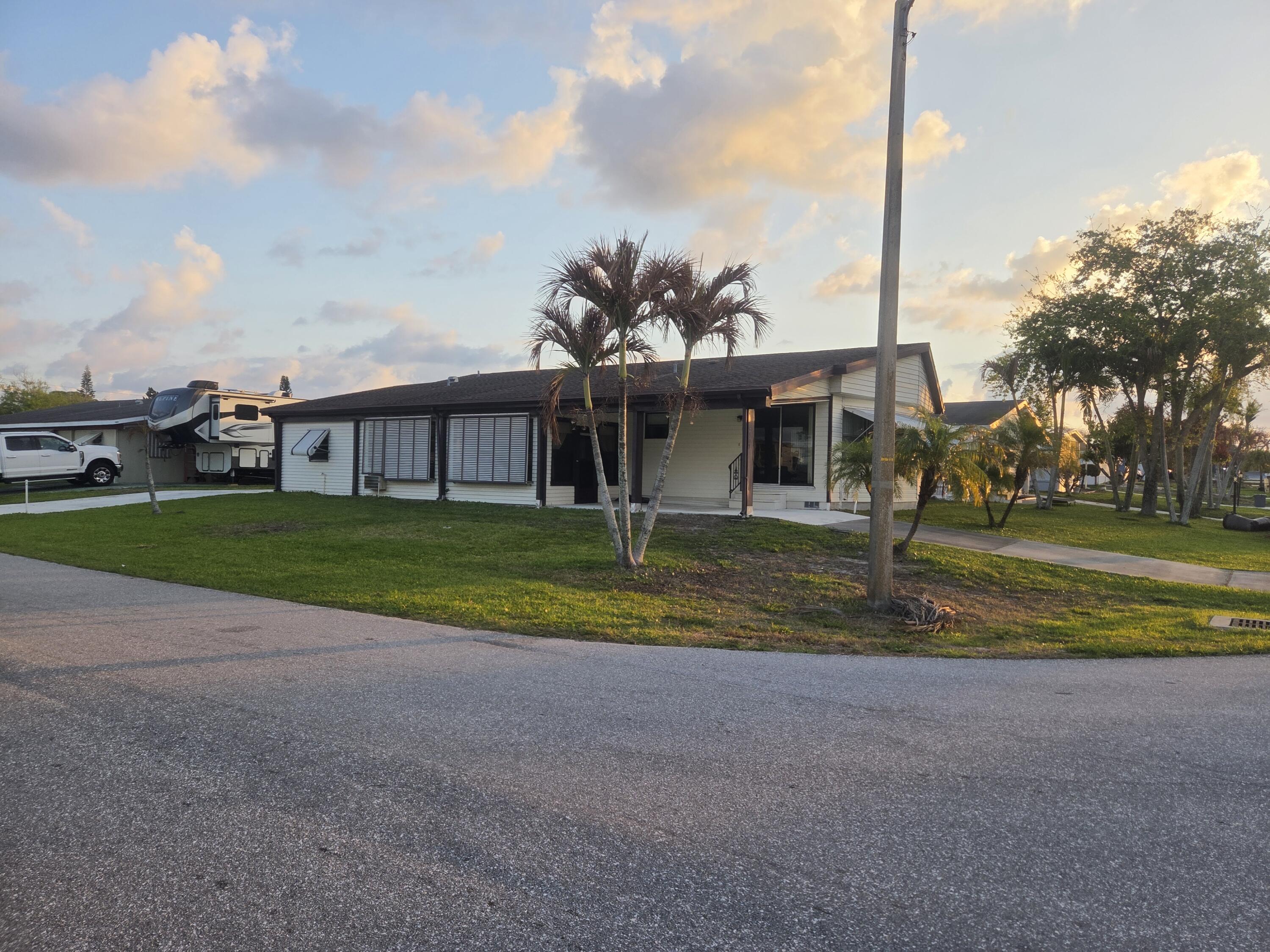 7107 Southeast Seahawk Street Hobe Sound, FL 33455 - Photo 3 of 22 side 2