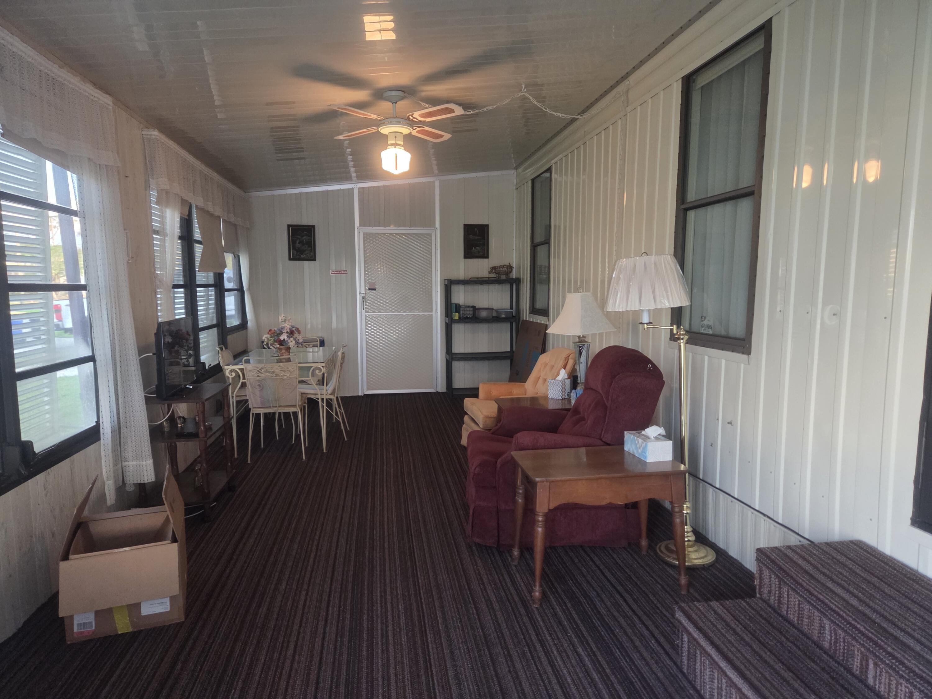 7107 Southeast Seahawk Street Hobe Sound, FL 33455 - Photo 6 of 22 florida room