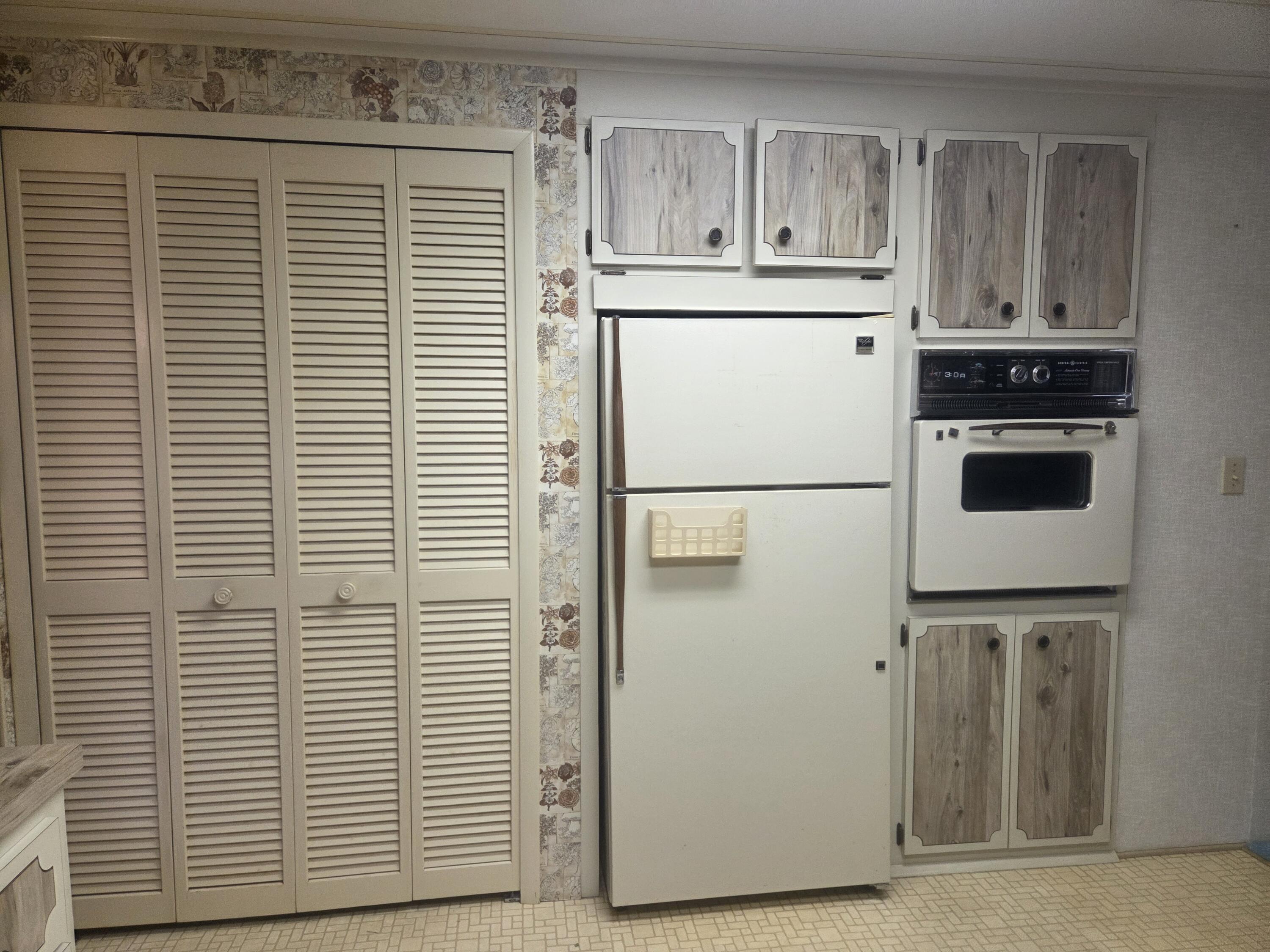 7107 Southeast Seahawk Street Hobe Sound, FL 33455 - Photo 7 of 22 kitchen 3