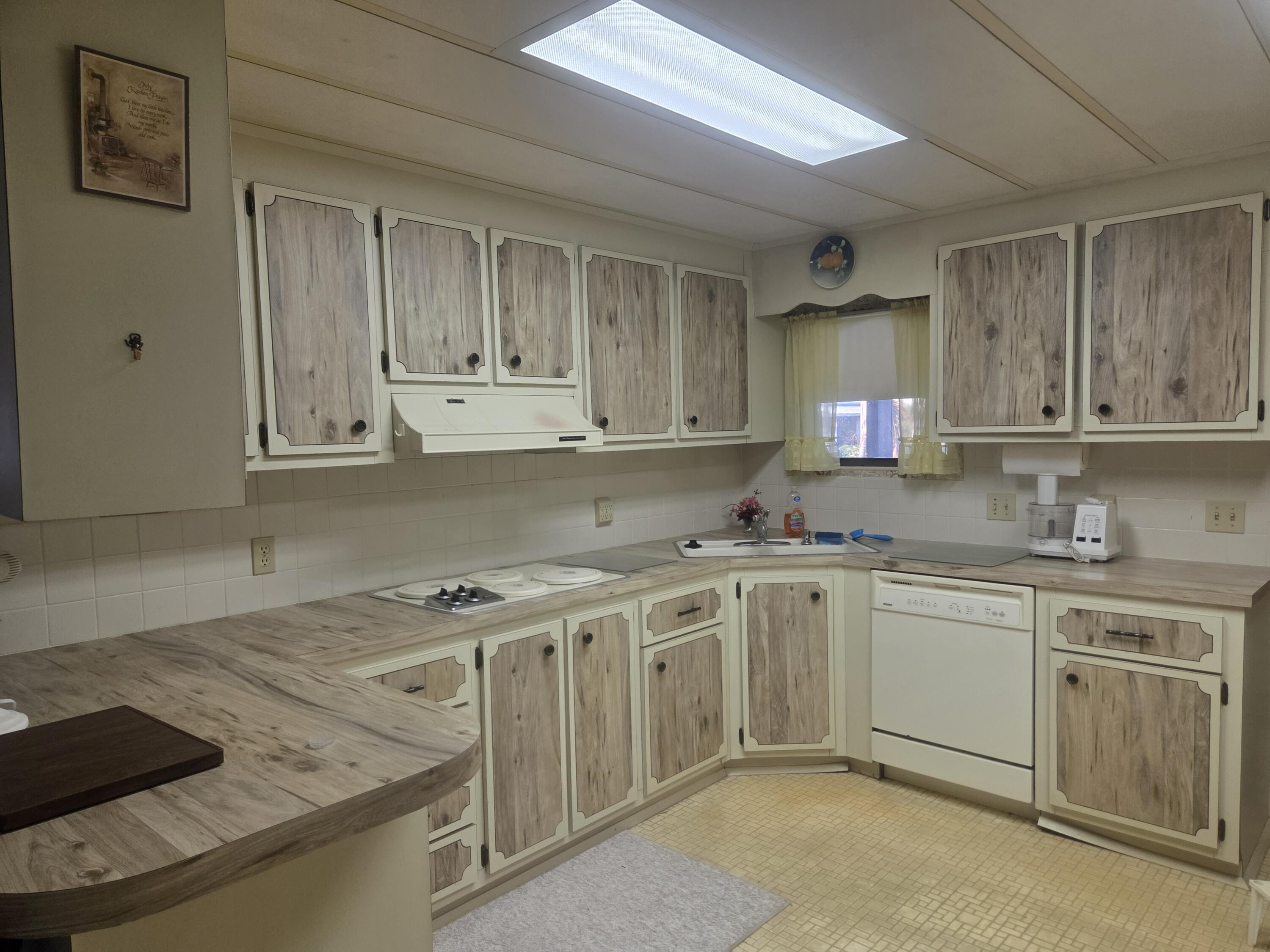 7107 Southeast Seahawk Street Hobe Sound, FL 33455 - Photo 8 of 22 kitchen 2