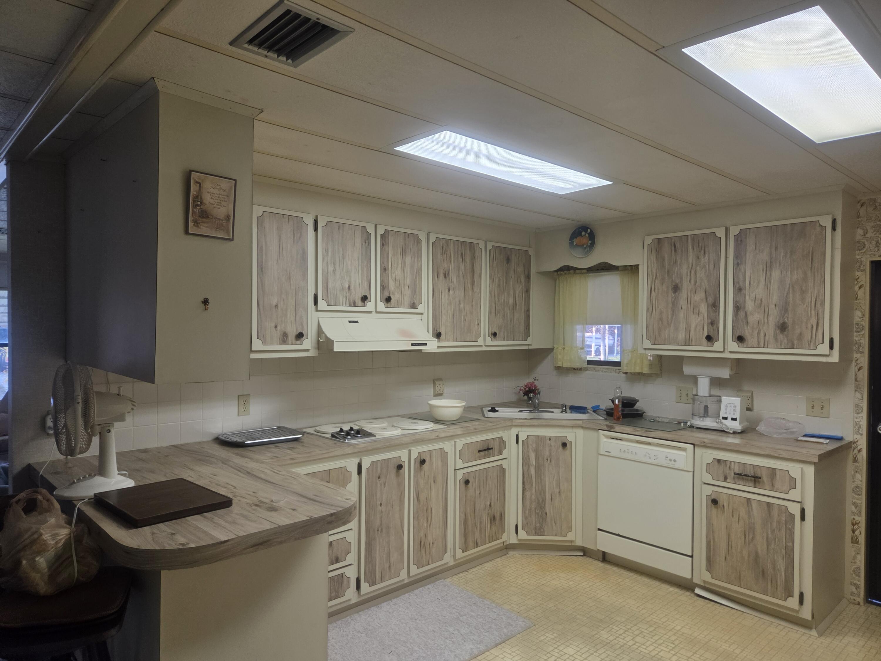 7107 Southeast Seahawk Street Hobe Sound, FL 33455 - Photo 9 of 22 kitchen