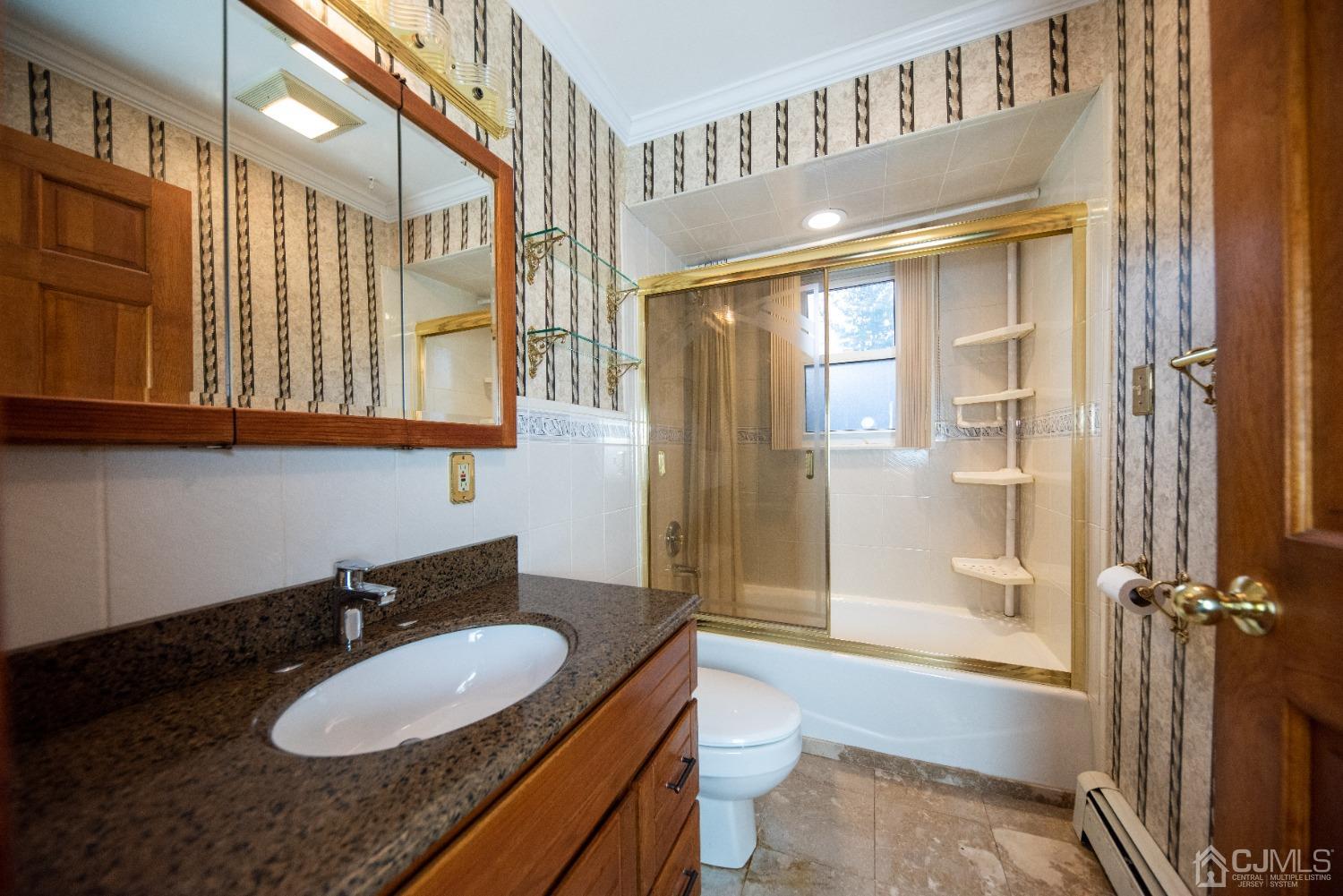 115 New Brooklyn Road Edison, NJ 08817 - Photo 19 of 53 a bathroom with a granite countertop sink toilet and shower