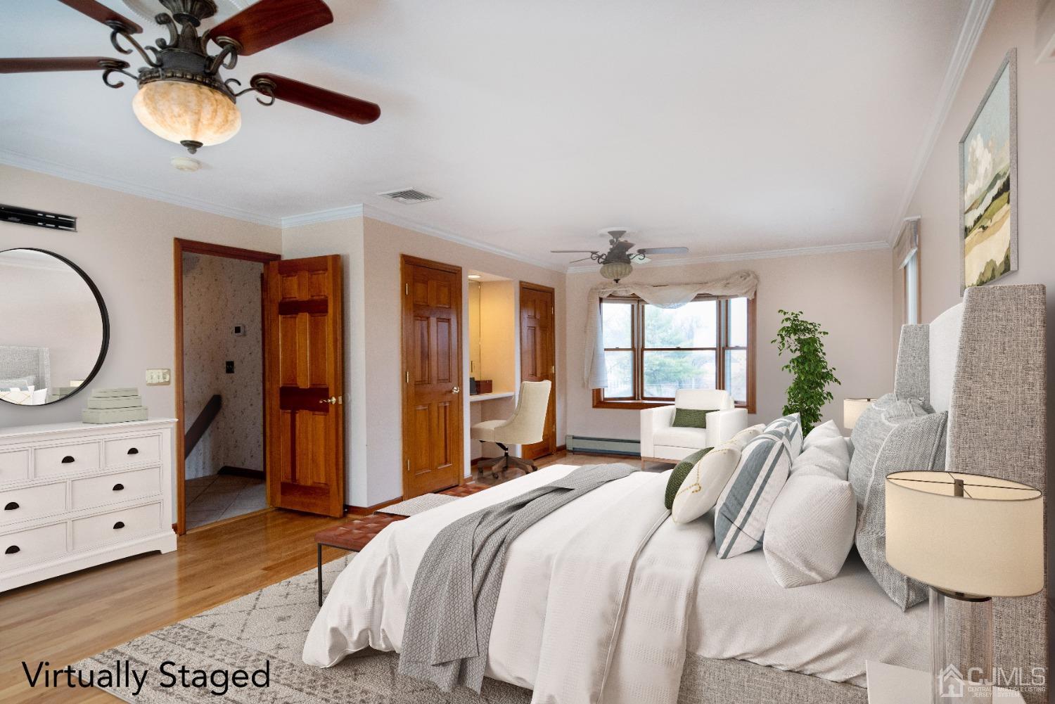 115 New Brooklyn Road Edison, NJ 08817 - Photo 29 of 53 a bedroom with a bed a chandelier and dresser
