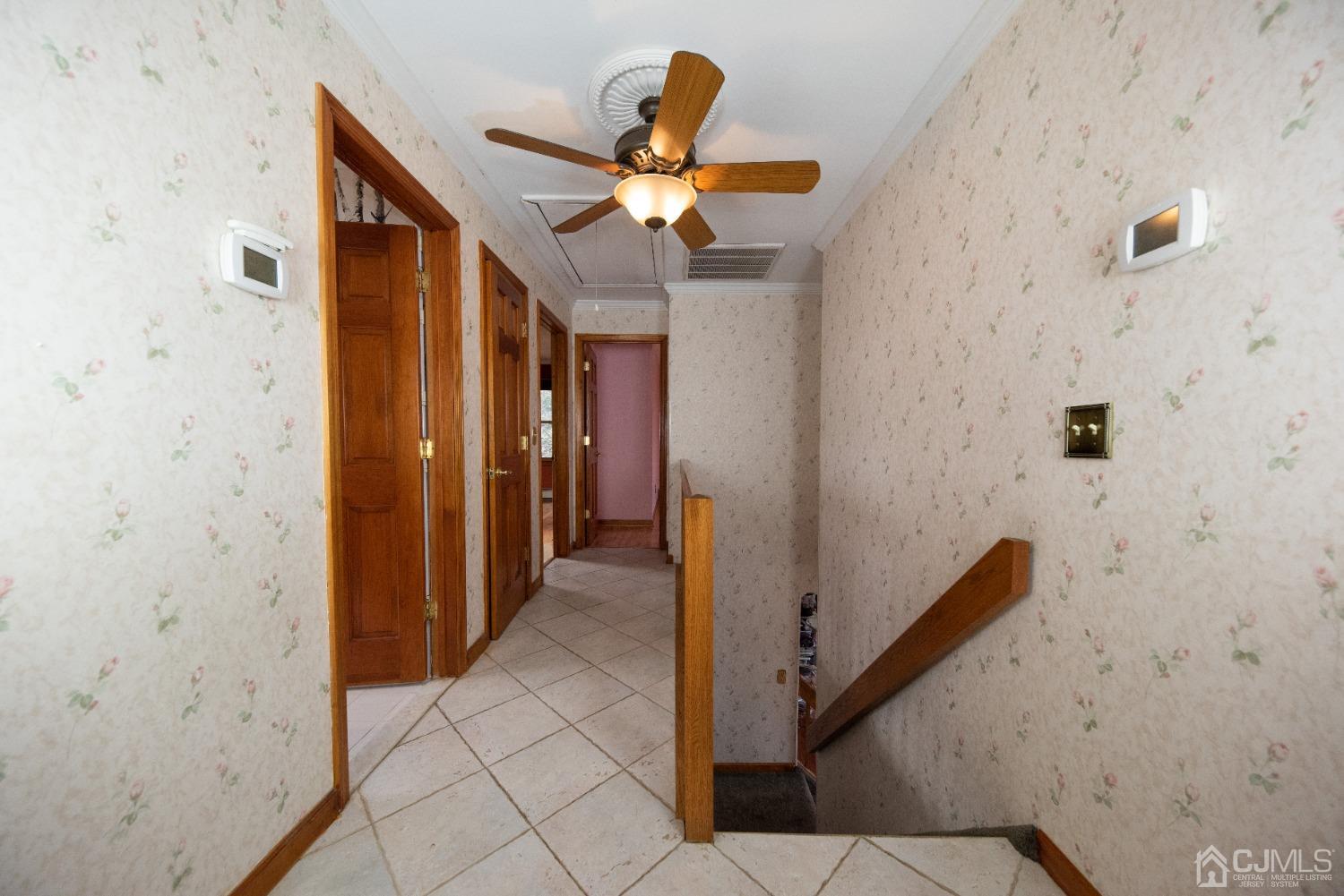 115 New Brooklyn Road Edison, NJ 08817 - Photo 30 of 53 a view of hallway with stairs