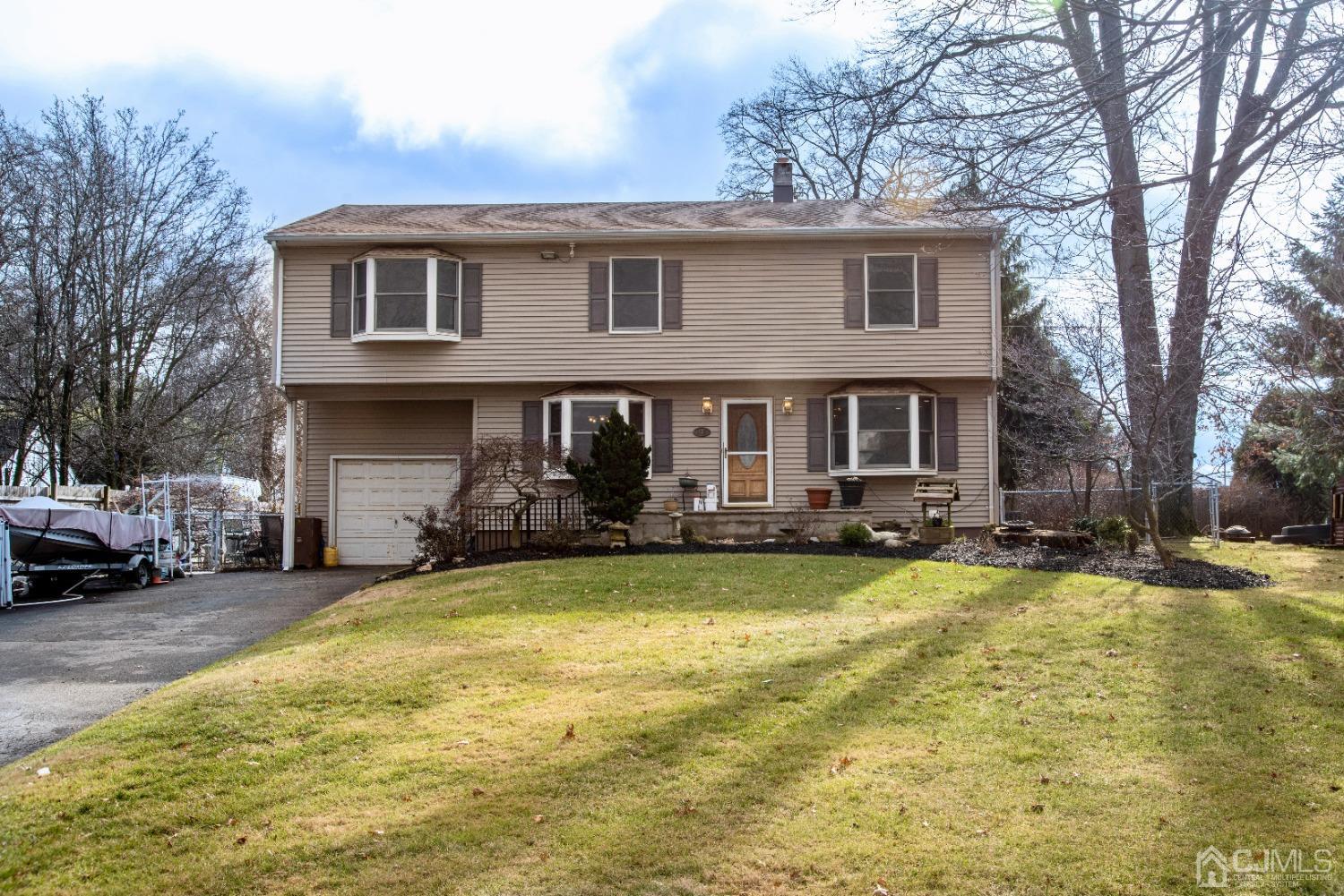 115 New Brooklyn Road Edison, NJ 08817 - Photo 3 of 53 a view of a house with swimming pool and sitting area