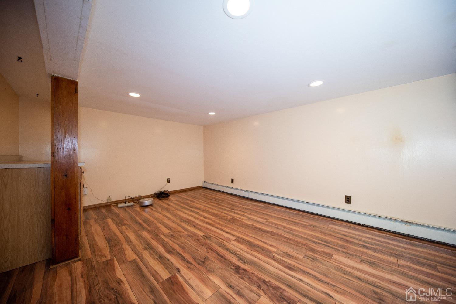 115 New Brooklyn Road Edison, NJ 08817 - Photo 31 of 53 a view of room with wooden floor