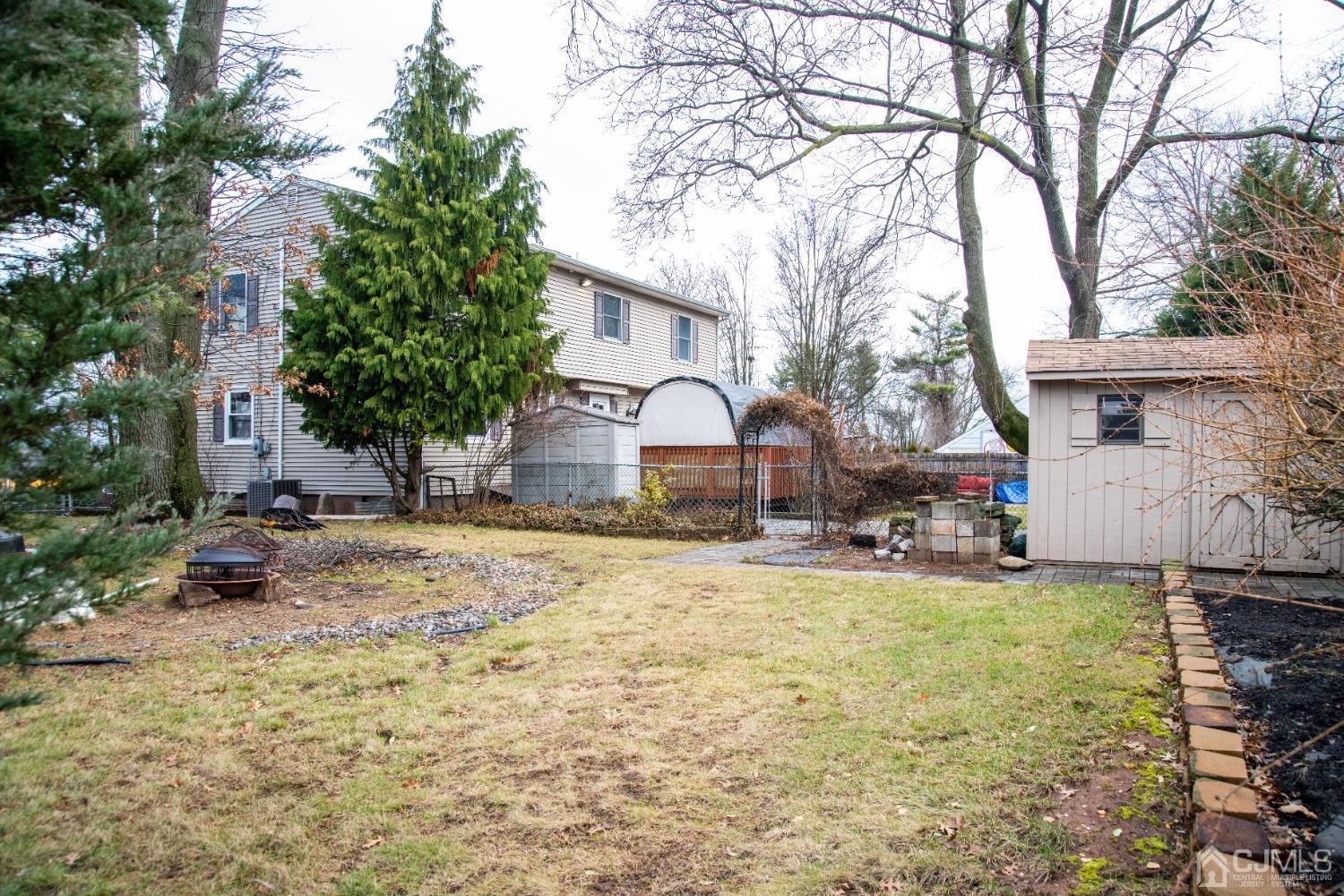115 New Brooklyn Road Edison, NJ 08817 - Photo 46 of 53 a view of a house with backyard and sitting area
