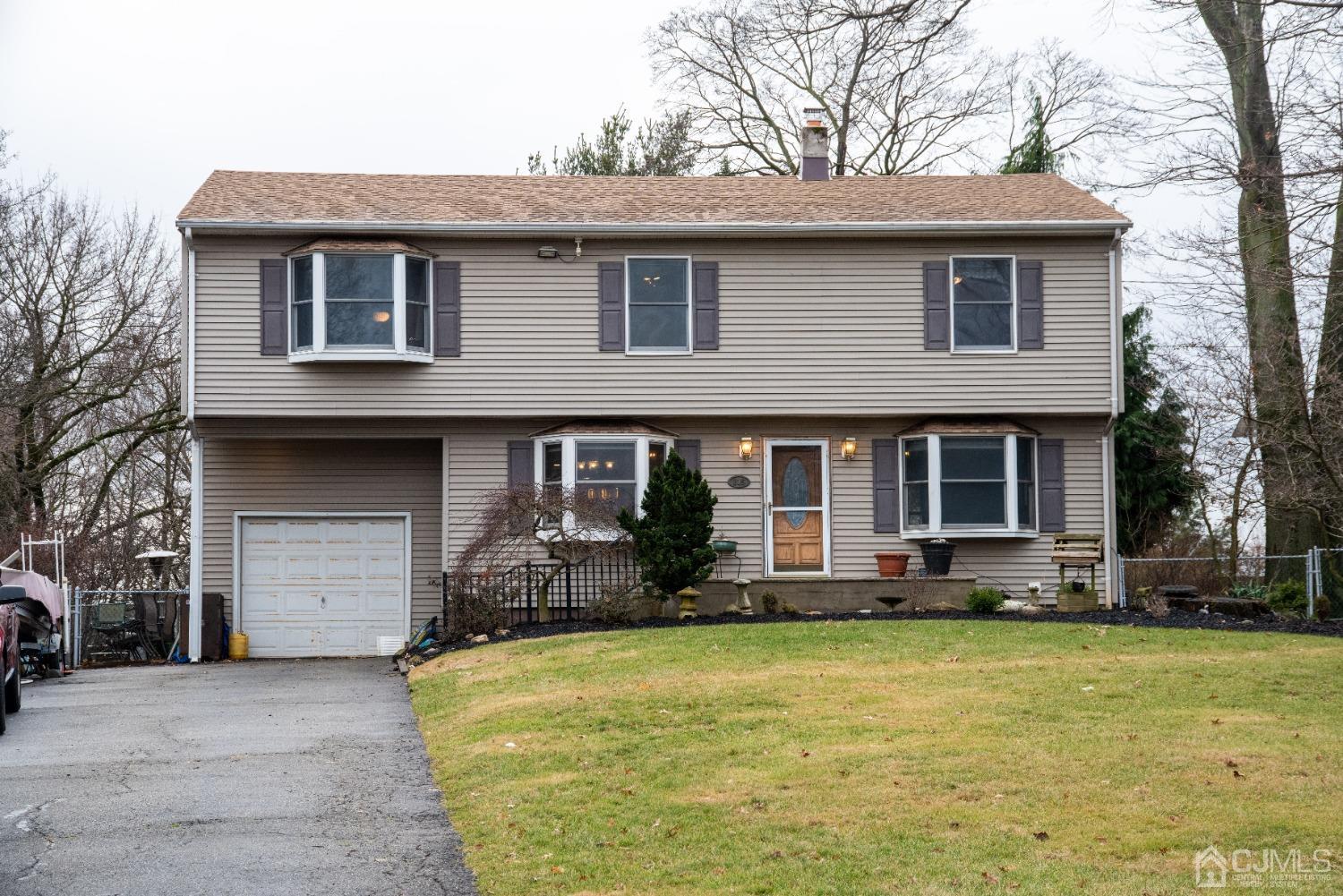 115 New Brooklyn Road Edison, NJ 08817 - Photo 50 of 53 a front view of a house with garage