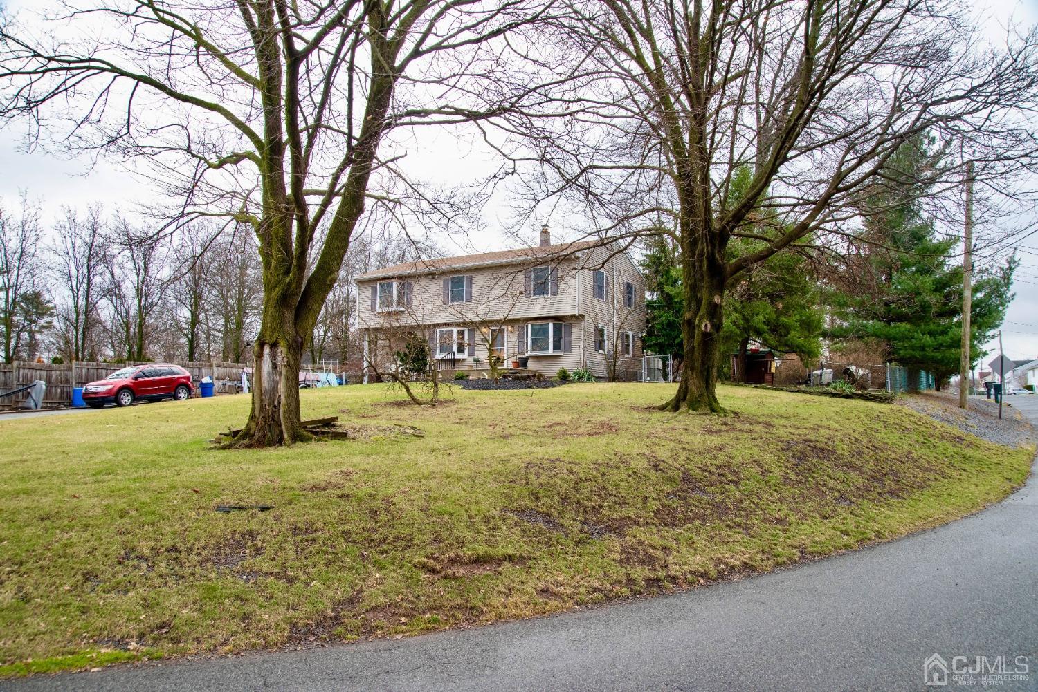115 New Brooklyn Road Edison, NJ 08817 - Photo 53 of 53 a view of a yard with a house in the background