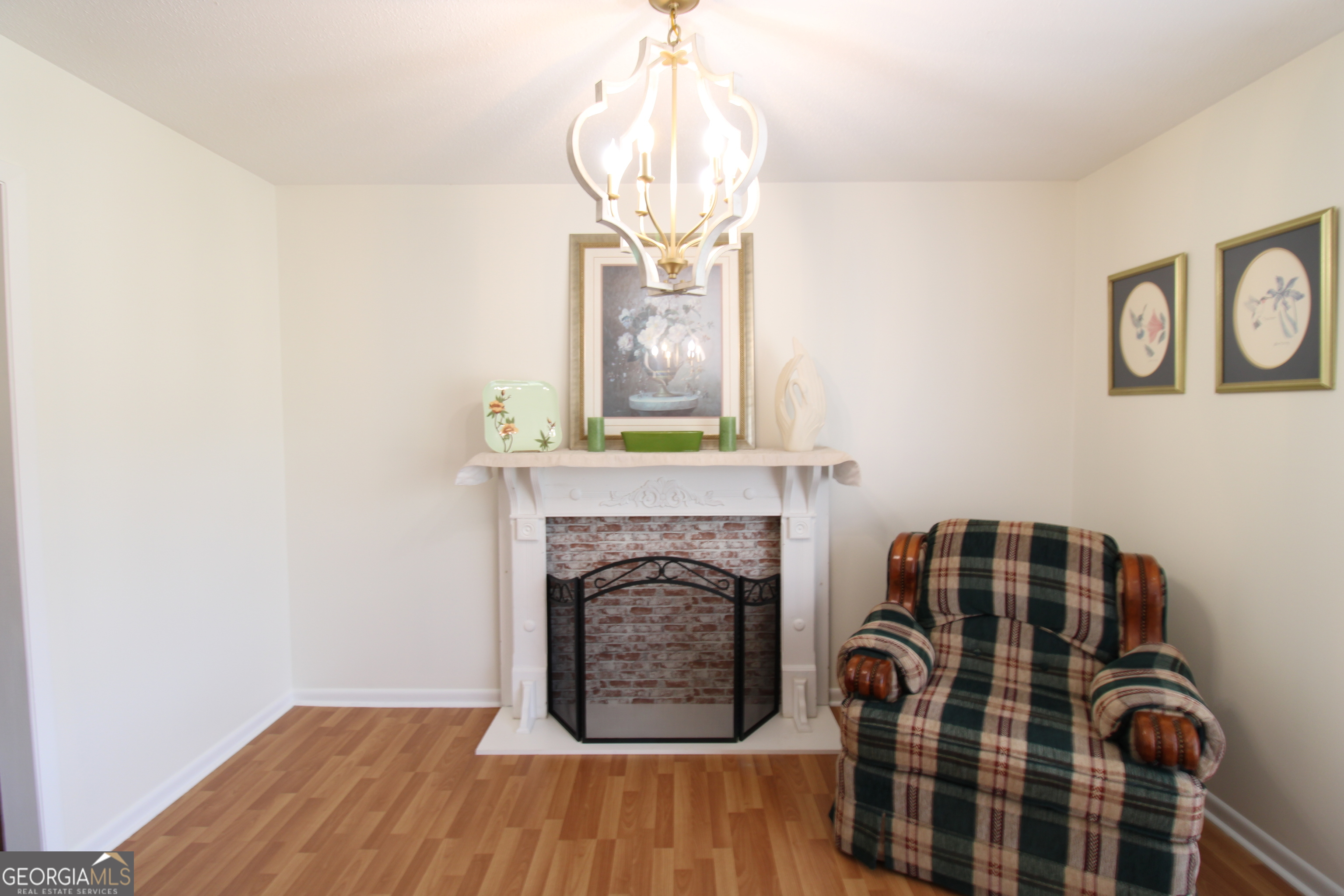 2337 Spring Street Waycross, GA 31503 - Photo 10 of 28 a view of fireplace with wooden floor