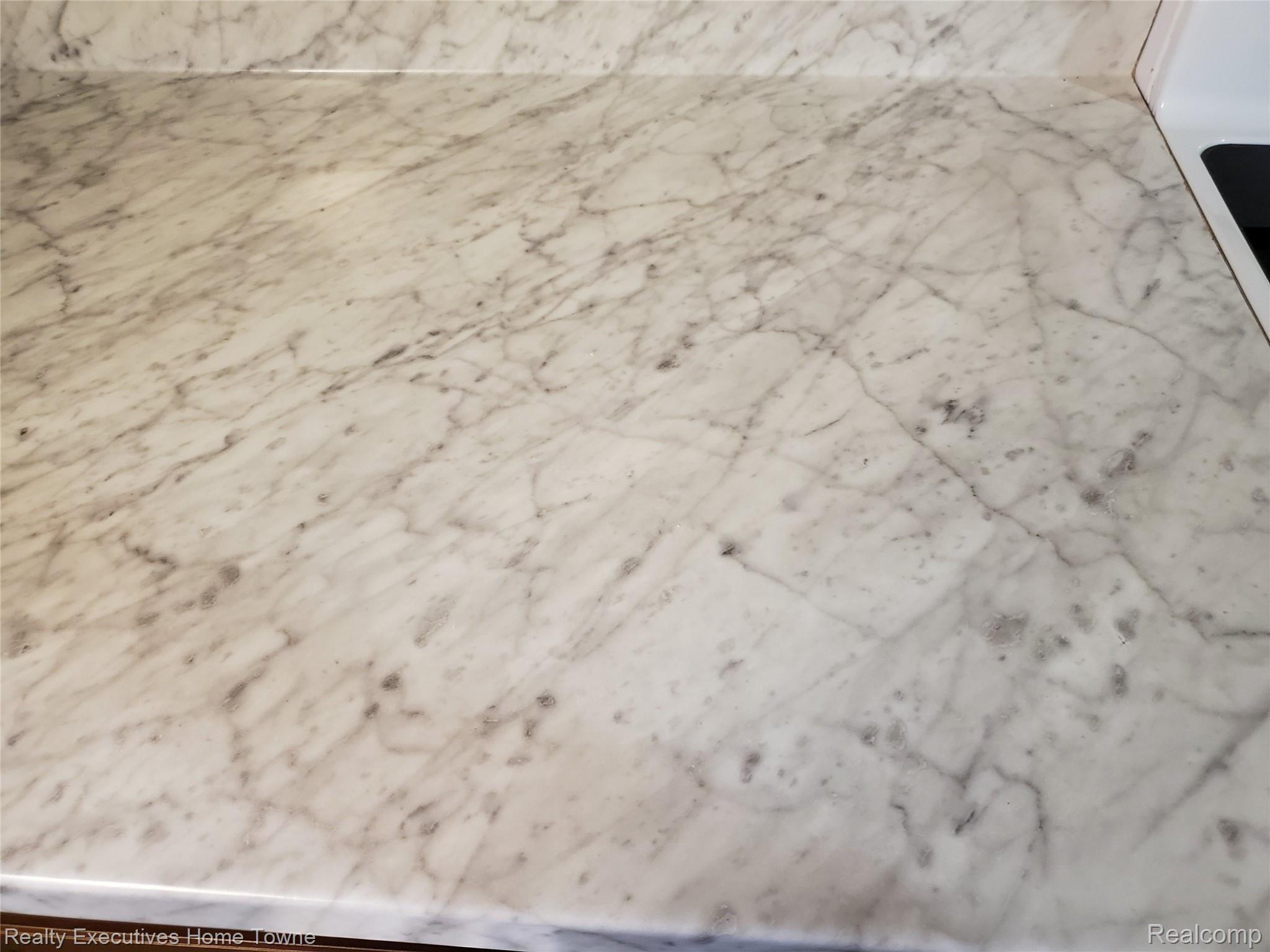 7864 Wildcat Road Jeddo, MI 48032 - Photo 20 of 39 Solid surface kitchen counter