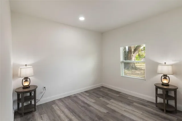 a bathroom with a shower toilet and sink